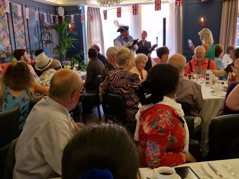 Worthing town crier Bob Smytherman reads the official VJ Day 80 proclamation