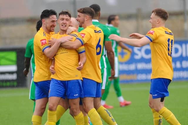 Lancing celebrate a Cup goal against Rusthall - they host Carshalton in the first qualifying round | Picture: Stephen Goodger