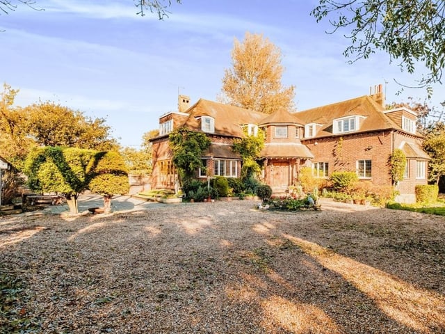 This property features six double bedrooms, great spaces for entertaining and ample parking with garage, car barn and large drive. It is on the market for £1.25million.