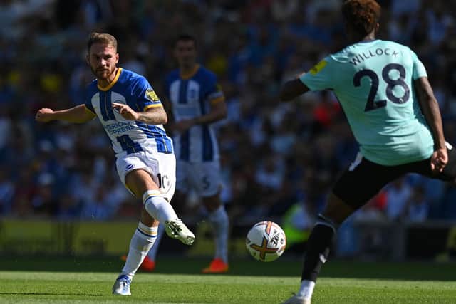 Brighton midfielder Alexis Mac Allister in action against Newcastle United (Photo by GLYN KIRK/AFP via Getty Images)