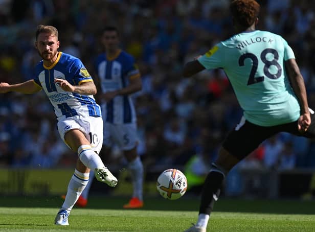 Brighton midfielder Alexis Mac Allister in action against Newcastle United (Photo by GLYN KIRK/AFP via Getty Images)