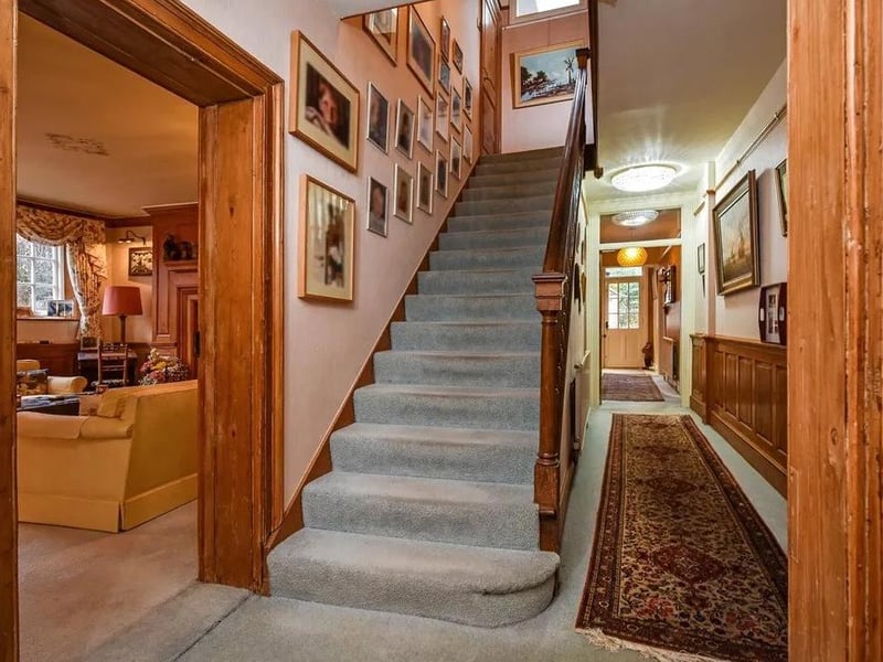 The main staircase leads from the entrance hall up to the first floor landing