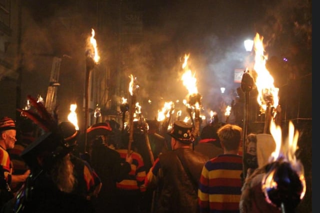 Flaming torches in the procession