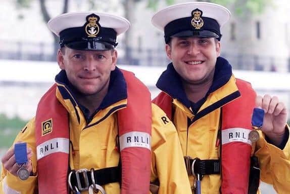 Eastbourne RNLI coxswain Mark Sawyer (left) and lifeboat mechanic Daniel Guy (right). Picture from the RNLI