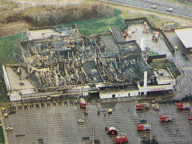 What was left behind of the store the morning after the fire started.