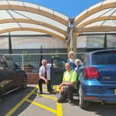 Welcoming Pamela Wilkinson to the new parking bays at Old Barn Nurseries in Dial Post are operations manager, Chris Harland, and branch manager Paul Smythe