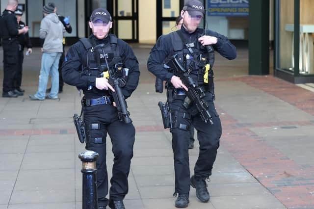 Armed police officers in Chapel Road, Worthing after the stabbing. Photo: Eddie Mitchell