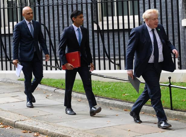 Health Secretary Sajid Javid, Chancellor of the Exchequer Rishi Sunak and Prime Minister Boris Johnson (Photo by Leon Neal/Getty Images)