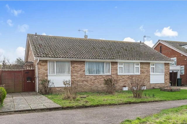 Located on the Eastern side of Selsey, set just one road back from the beach is this semi detached bungalow with two bedrooms but is in need of modernisation throughout. It is on the market for £285,000 with Henry Adams in Zoopla.