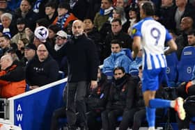 BRIGHTON, ENGLAND - APRIL 25: Pep Guardiola, Manager of Manchester City, looks on during the Premier League match between Brighton & Hove Albion and Manchester City at American Express Community Stadium on April 25, 2024 in Brighton, England. (Photo by Mike Hewitt/Getty Images)