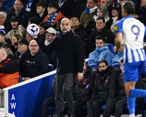 BRIGHTON, ENGLAND - APRIL 25: Pep Guardiola, Manager of Manchester City, looks on during the Premier League match between Brighton & Hove Albion and Manchester City at American Express Community Stadium on April 25, 2024 in Brighton, England. (Photo by Mike Hewitt/Getty Images)