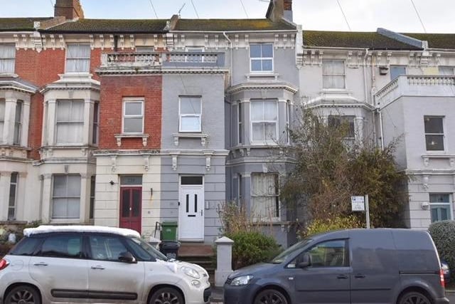 The flat is situated in a Victorian building in Braybrooke Road, close to the town centre