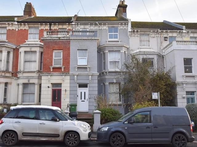 The flat is situated in a Victorian building in Braybrooke Road, close to the town centre