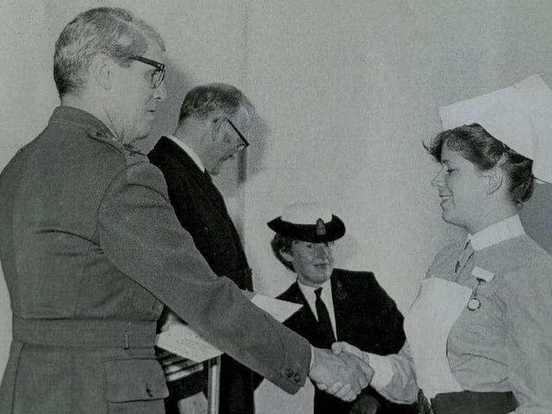 Debbie Bushby, social wellness co-ordinator, served nine years as a QARNNS Naval Nurse and is seen her receiving an award