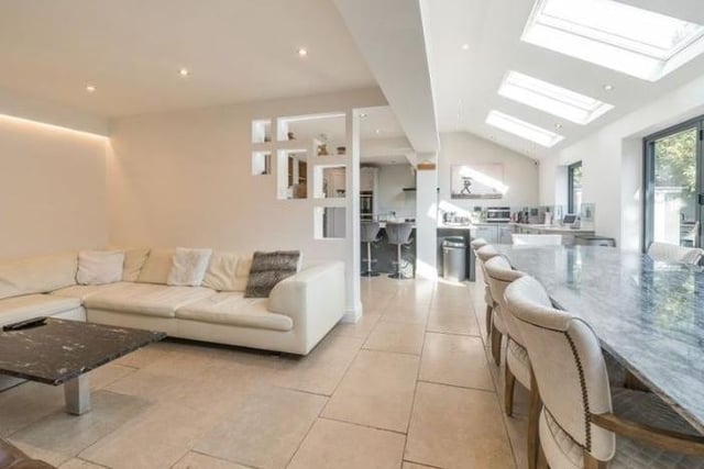 A light and airy family room leading off the top of the range kitchen