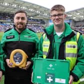 St John Ambulance volunteers, from left to rgiht: Peter Bennett, Declan Dexter and Myles Donald with lifesaving equipment