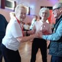 Blind veterans on holiday in Rustington dance with local residents at Cliff Richard tribute concert.