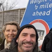 Green Party councillors Emily O’Brien, Johnny Denis and Lucy Agace pictured with Glynde resident Douglas Barrett and the reinstated signs.