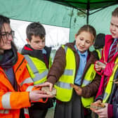 More than 20,000 artefacts unearthed in a detailed archaeological survey carried out on the site of the proposed extension to the Home of Rolls-Royce at Goodwood. Children from Years 3, 4 and 5 at The March CE Primary School, which adjoins the Home of Rolls‑Royce, were invited onto the site to see the work at first hand. Photo: Rolls-Royce Motor Cars
