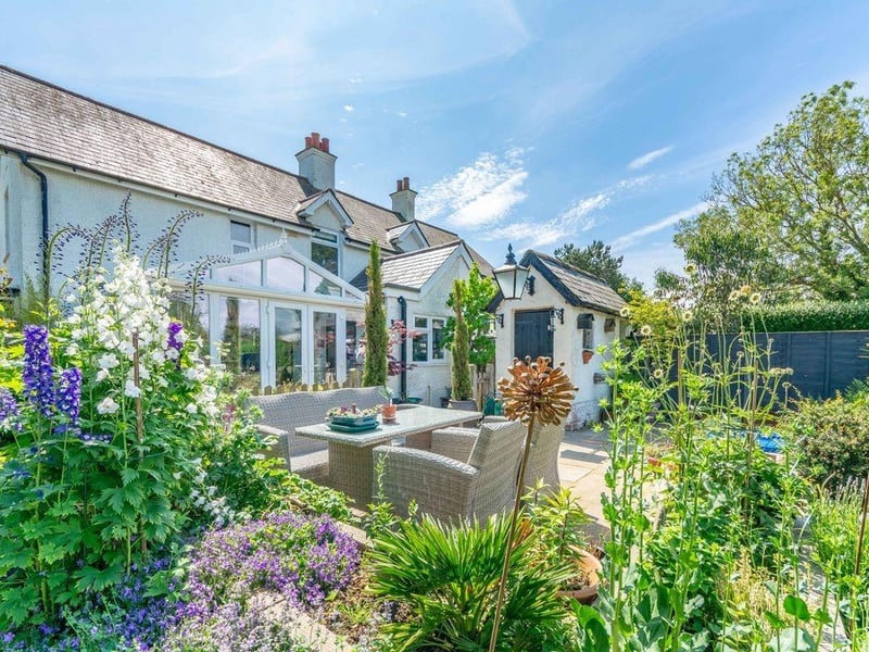 This three-bedroom character property is beautifully presented and Barnham-based Pegasus Properties say the attractive landscaped garden is of particular note.