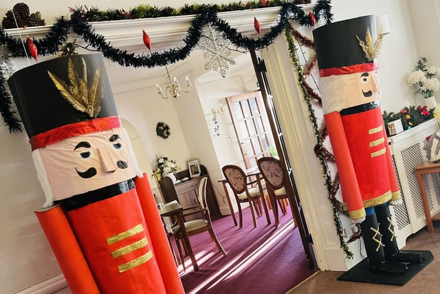 Christmas Jumper Day at Oakland Grange in Littlehampton with Bill and Ted, the giant nutcrackers standing guard