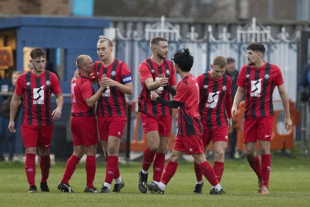Worthing players celebrate their equaliser against Selsey