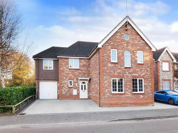 This significantly-extended, modern-style detached house is pleasantly located within the popular Marlborough Place development in Littlehampton. It has just come on the market with Glyn Jones at £595,000.
