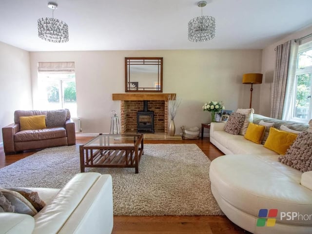 The sitting room has a log burner