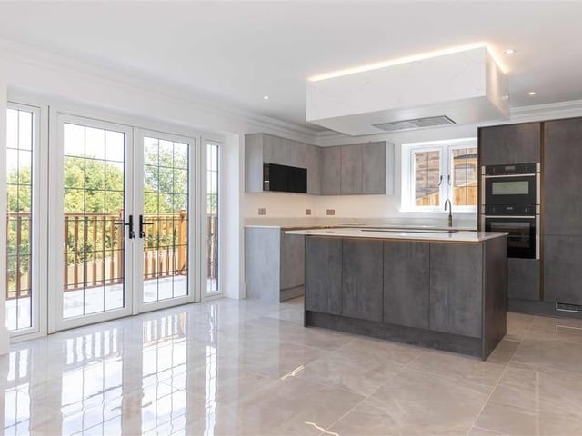 Offers in excess of £900,000 are invited for this new luxury property in Mill Lane, High Salvington. It has beautiful views over the South Downs, versatile and spacious accommodation.