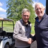 Keith Rayner wins the Three clubs and a Putter, getting his prize from Bob Andrews