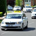 The revised fare table sets out maximum charges for taxis carrying between one and four passengers, as well as larger vehicles licensed to carry five to eight passengers. Picture by Hollie R