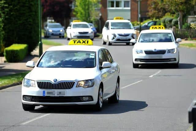 The revised fare table sets out maximum charges for taxis carrying between one and four passengers, as well as larger vehicles licensed to carry five to eight passengers. Picture by Hollie R