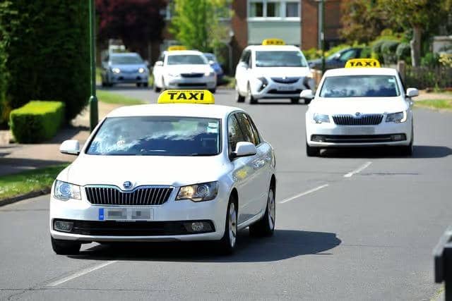 The revised fare table sets out maximum charges for taxis carrying between one and four passengers, as well as larger vehicles licensed to carry five to eight passengers. Picture by Hollie R