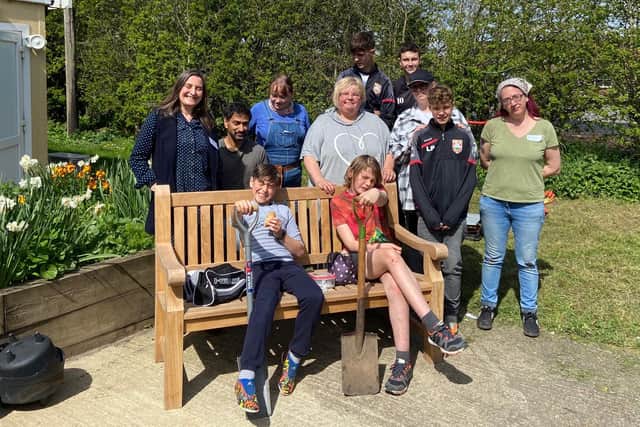 Southwick 1882 Youth FC at Sussex MS Centre with garden designer Kate Orchard and Owen Alvares, botanical horticulturist from Royal Botanic Gardens, Kew, for a day of gardening