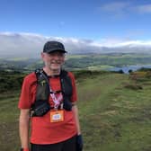 Mark on the hills above Minehead during the course of his 30-mile charity run
