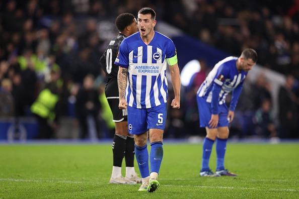 Lewis Dunk of Brighton & Hove Albion celebrates after the team's victory