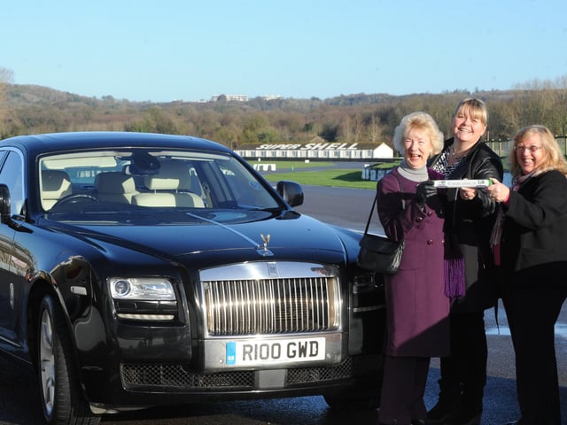 June Moran, Lisa Emmerson and Yvonne Price took the WI centenary baton on a lap of honour at Goodwood Motor Circuit in Lord March's Rolls-Royce in January 2015