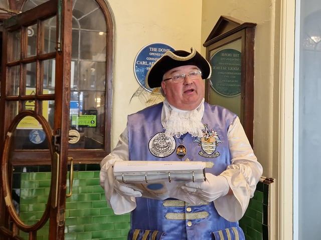 Worthing town crier Bob Smytherman launched his new walk on Tuesday, April 2, followed by afternoon tea at Worthing Town Hall to raise money for the mayor's charities, Broadwater Support Group and Community Hub, CYCALL inclusive cycling and the Parkinson's UK Worthing and Washington Group. Using information provided by The Worthing Society, Bob led a group of around 20 people on a three-hour walk around the town centre and seafront, giving many stories of the area's history en route.
