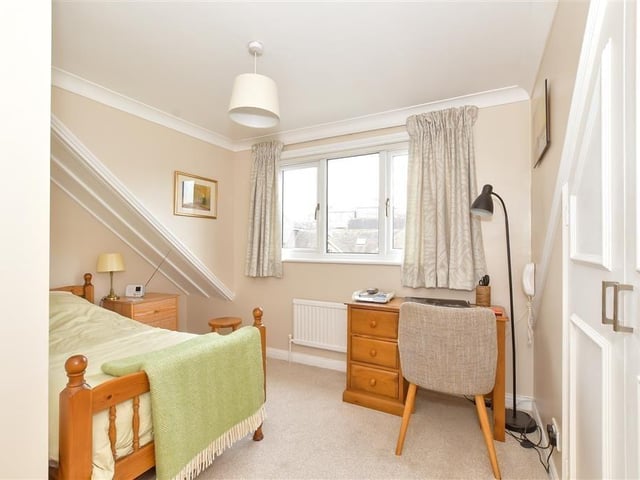 This modern town house with waterside garden is tucked away on a desirable private development in the heart of Arundel. It comes to the market with Cubitt & West, priced at £700,000.