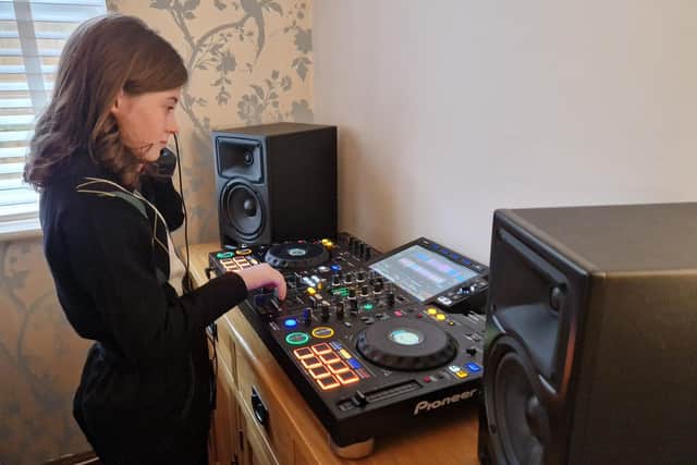 12-year-old Ruby Shepherd from DJ duo Pitch & Strut on the decks. Picture: Elaine Hammond / Sussex World
