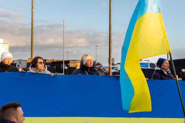 The vigil which was held in Hastings on February 24, 2023 to mark the first anniversary of the Russian invasion of Ukraine. Picture by Sarah Marland