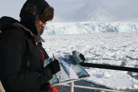 Emma Stibbon conducting fieldwork in Svalbard, 2022. Photo by Tristan Duke