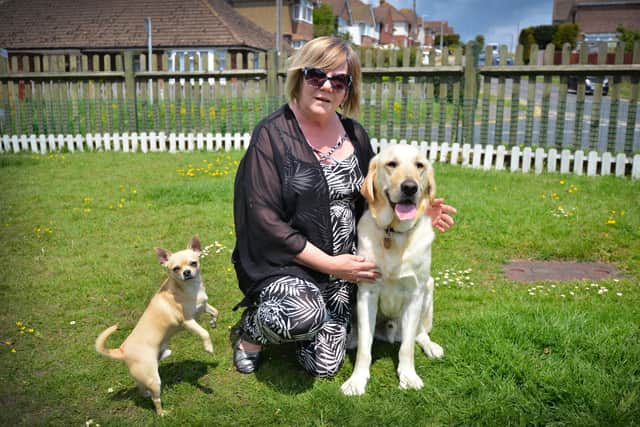 Dawn Penney with her guide dog Mr Miller in Sidley, Bexhill.
Also pictured is Louie.
