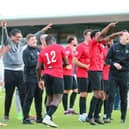 Lewes manager Tony Russell and the players celebrate after the FA Cup win. Picture: James Boyes