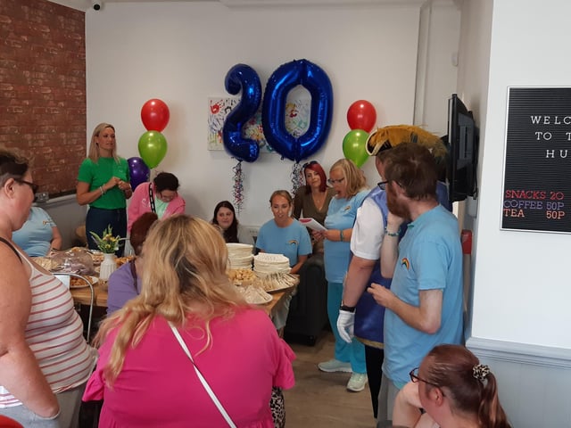 Frontline Associates Supported Tenancies celebrates the company's 20th anniversary and the first anniversary of the Frontline Hub, in Rowlands Road, Worthing, with a party for staff, service users and guests included Worthing town crier Bob Smytherman