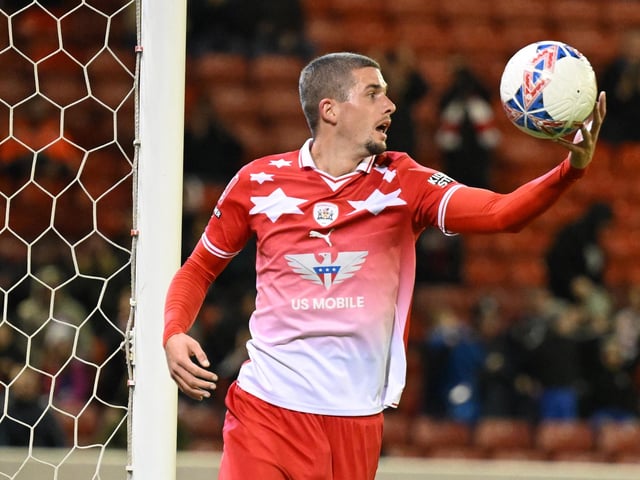 Max Watters of Barnsley celebrates his goal to make it 1-0 during the Emirates FA Cup First Round match between Barnsley and Horsham at Oakwell Stadium.