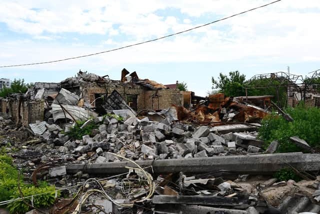 A picture taken on July 3, 2022 shows destroyed buildings in a residential area near Irpin, on Vokzalnaya street, which links the Ukrainian cities of Bucha and Irpin, amid the Russian invasion of Ukraine. (Photo by Miguel MEDINA / AFP) (Photo by MIGUEL MEDINA/AFP via Getty Images)
