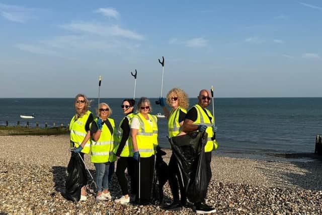 A team from Henry Adams New Homes and Persimmon Homes, Manor Gardens, help keep Selsey beach clean