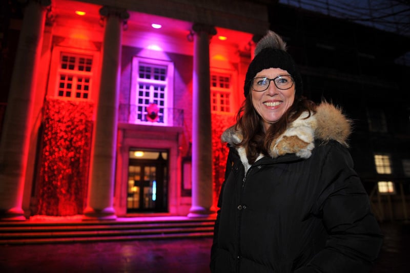 Melanie Tyerman outside the illuminated Worthing Town Hall