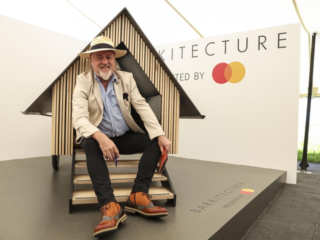 Bill Bailey tests out a Barkitecture entry. Photo: Kieran Cleeves, PA